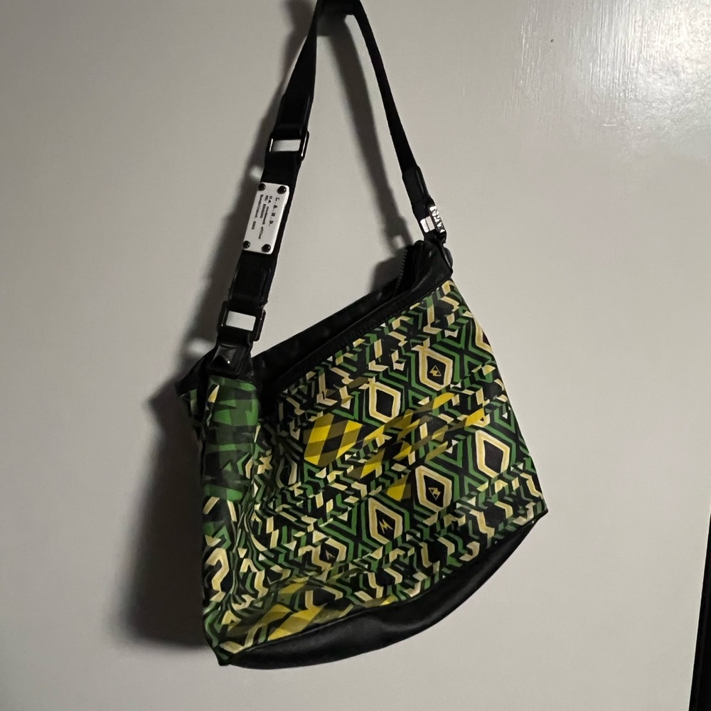 L.a.m.b. Shoulder bag. Good used condition. Striped interior.